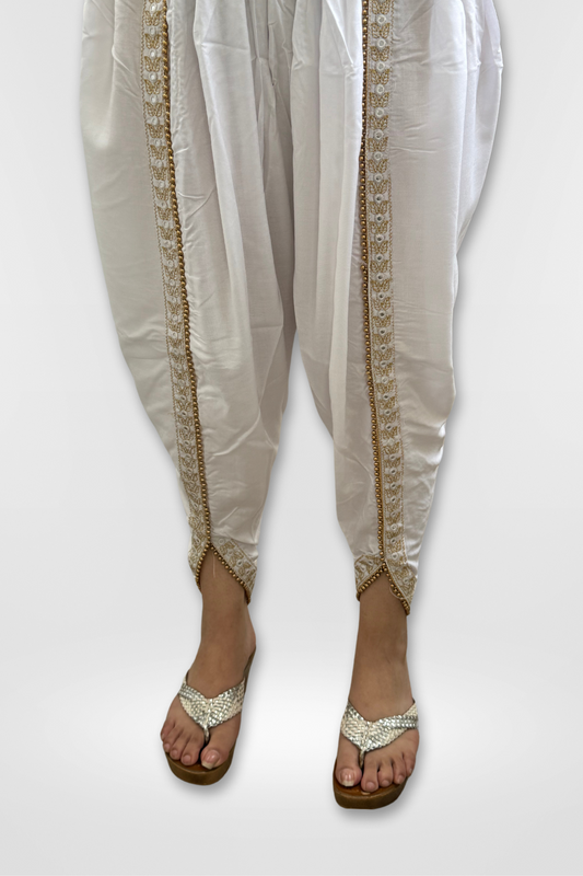 Our Rayon Dhoti Pants feature intricate embroidery and a Golden Pearl Lace.