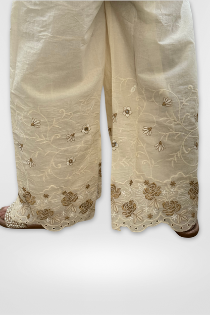 Our Palazzo made with Pure Cotton and adorned with elegant Golden Embroidery.