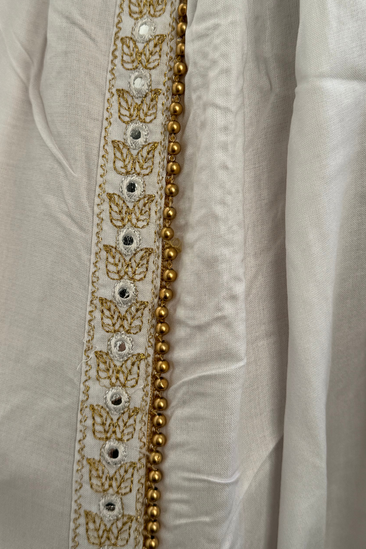 Our Rayon Dhoti Pants feature intricate embroidery and a Golden Pearl Lace.