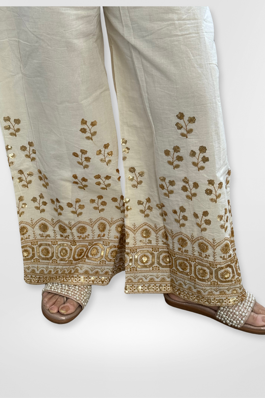 Our Palazzo made with Pure Cotton and adorned with elegant Gold Sequin Embroidery.