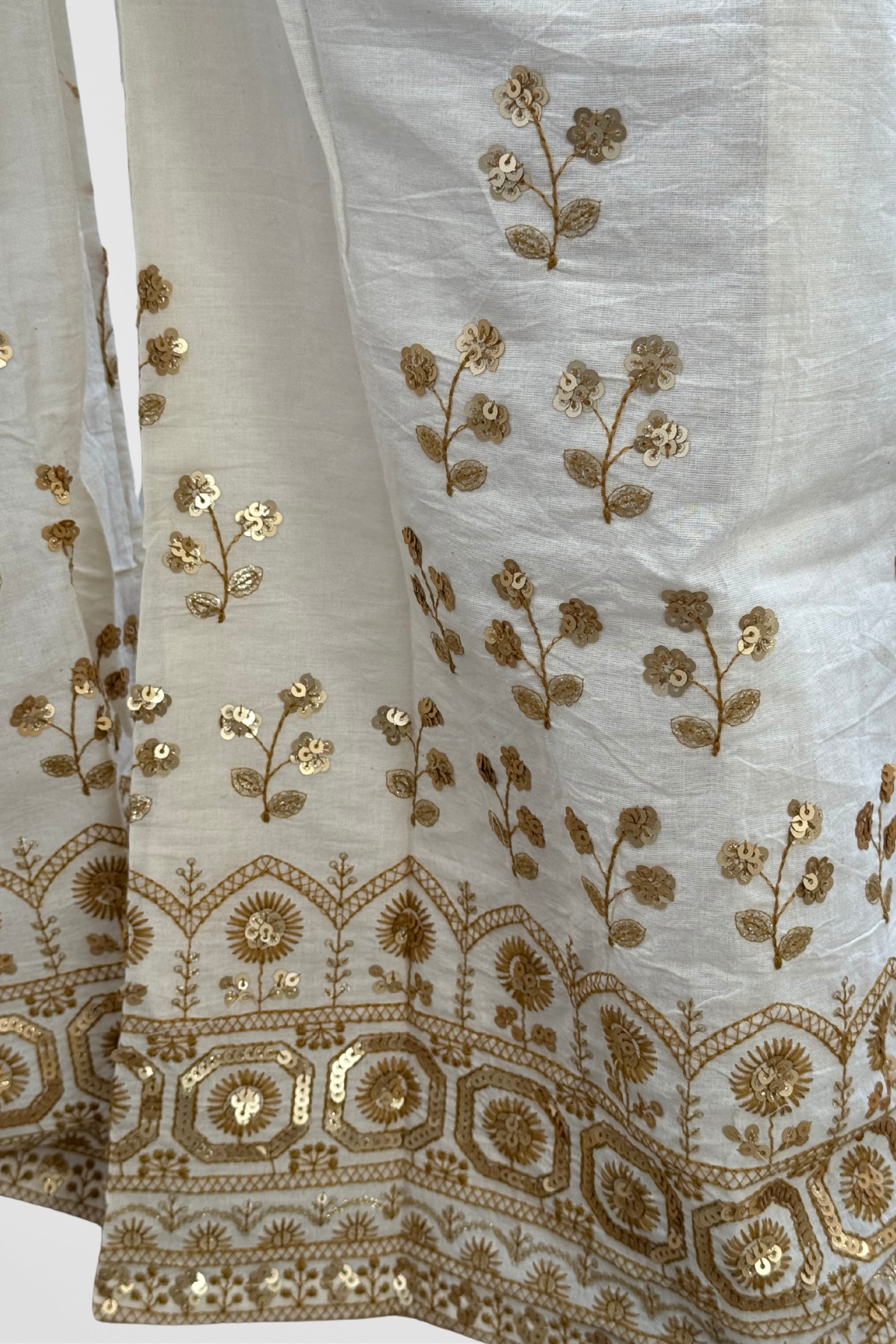 Our Palazzo made with Pure Cotton and adorned with elegant Gold Sequin Embroidery.