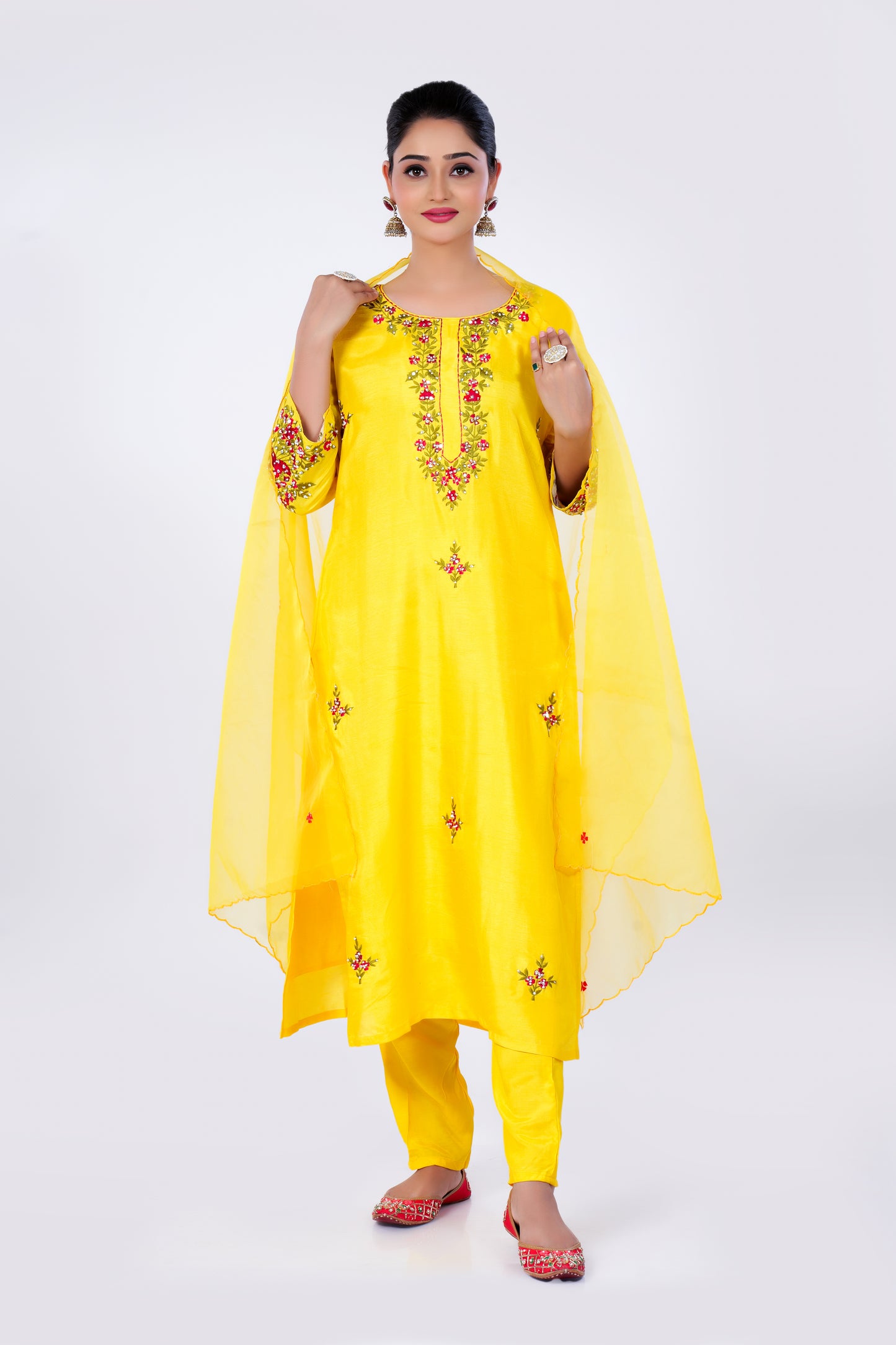 Straight Kurta Set with Organza Dupatta is made from luxurious Dola Silk and Hand Embroidery in Yellow Colour