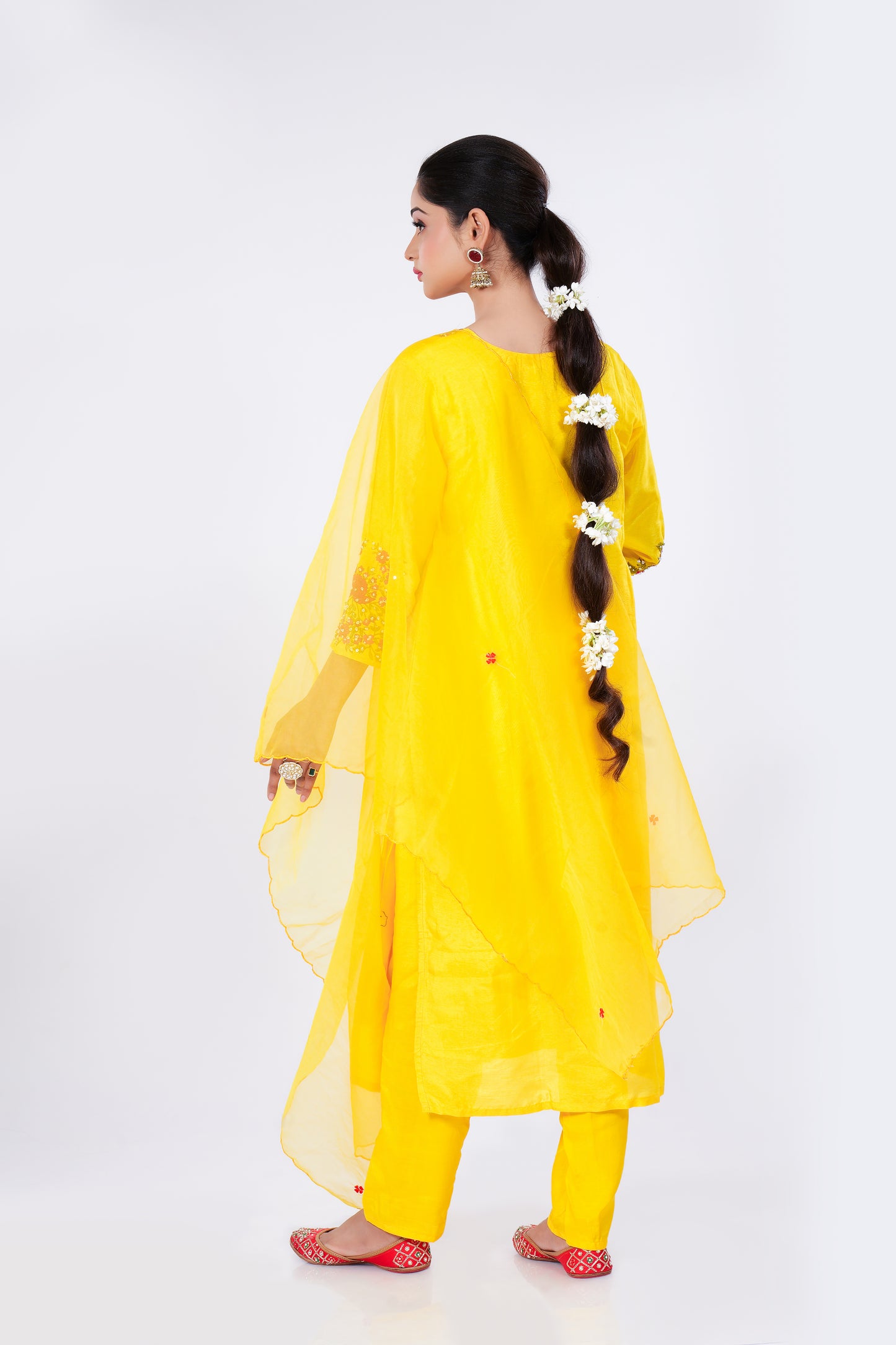 Straight Kurta Set with Organza Dupatta is made from luxurious Dola Silk and Hand Embroidery in Yellow Colour