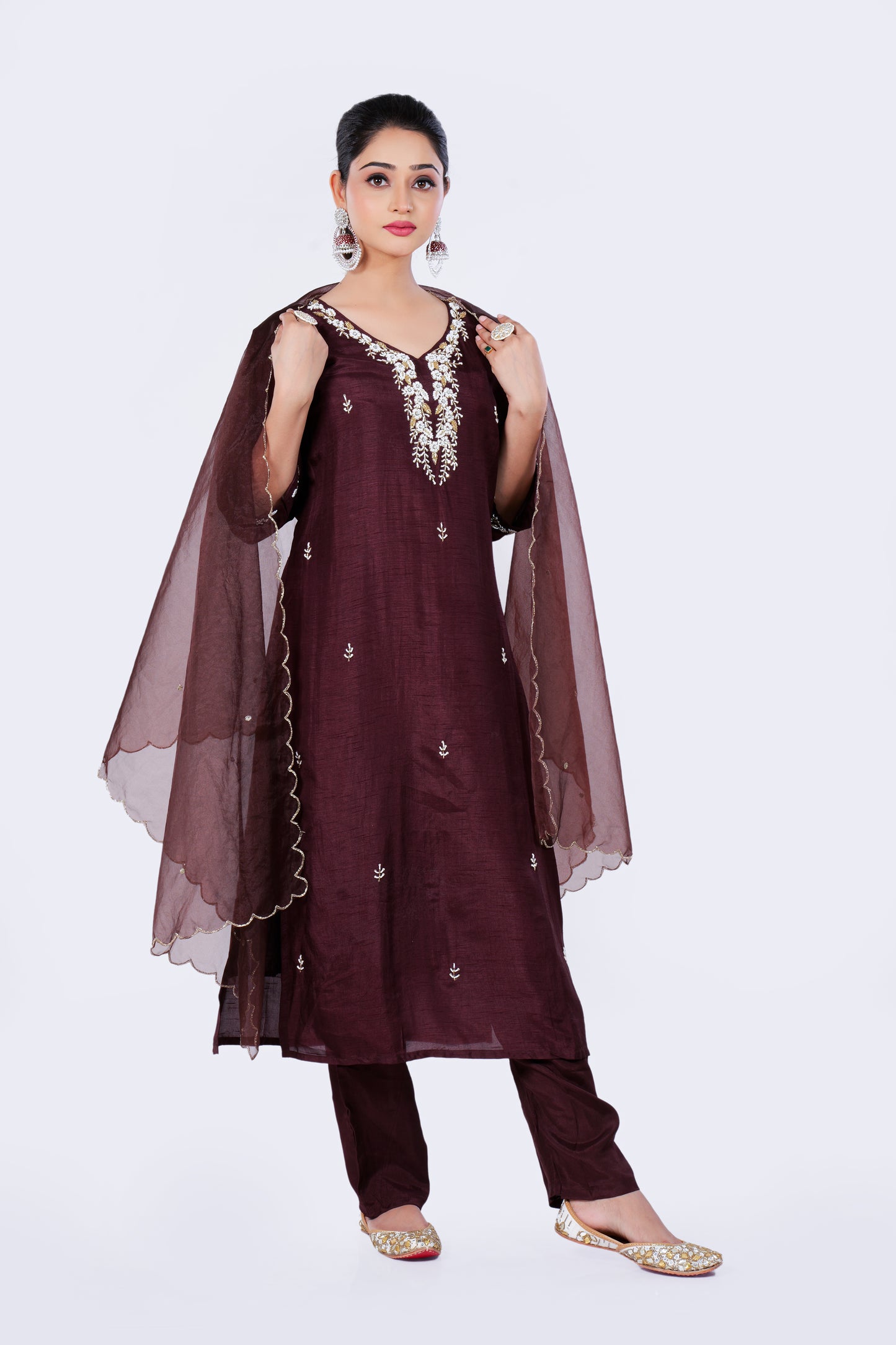Straight Kurta Set with Organza Dupatta is made from luxurious Dola Silk and Zardozi Embroidery in Maroon Colour