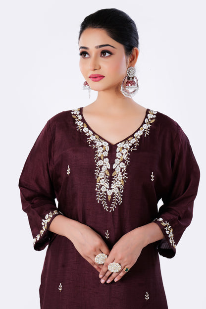 Straight Kurta Set with Organza Dupatta is made from luxurious Dola Silk and Zardozi Embroidery in Maroon Colour