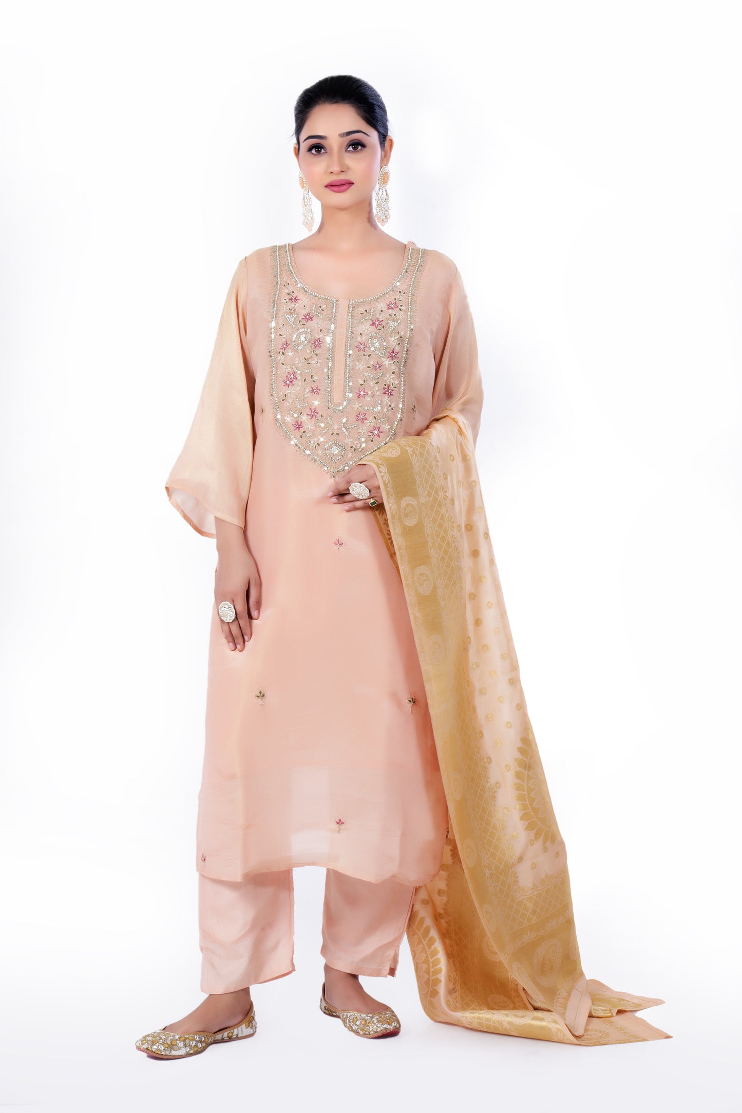 Straight Kurta Set with Banarasi Dupatta is made from luxurious Tissue and Zardozi Embroidery in Peach Colour