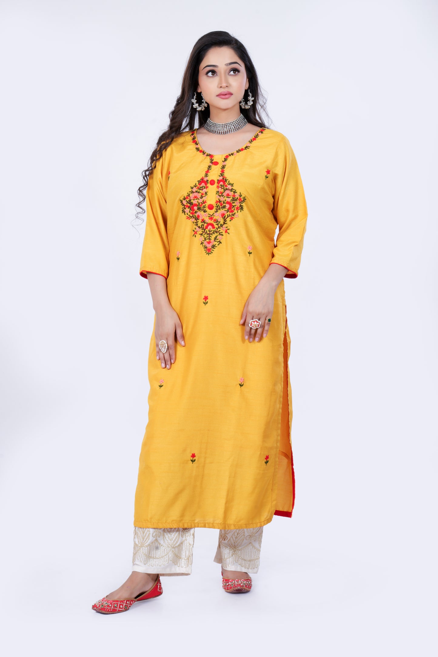 Straight Kurta is made from Soft Dola Silk and Hand Embroidery in Yellow