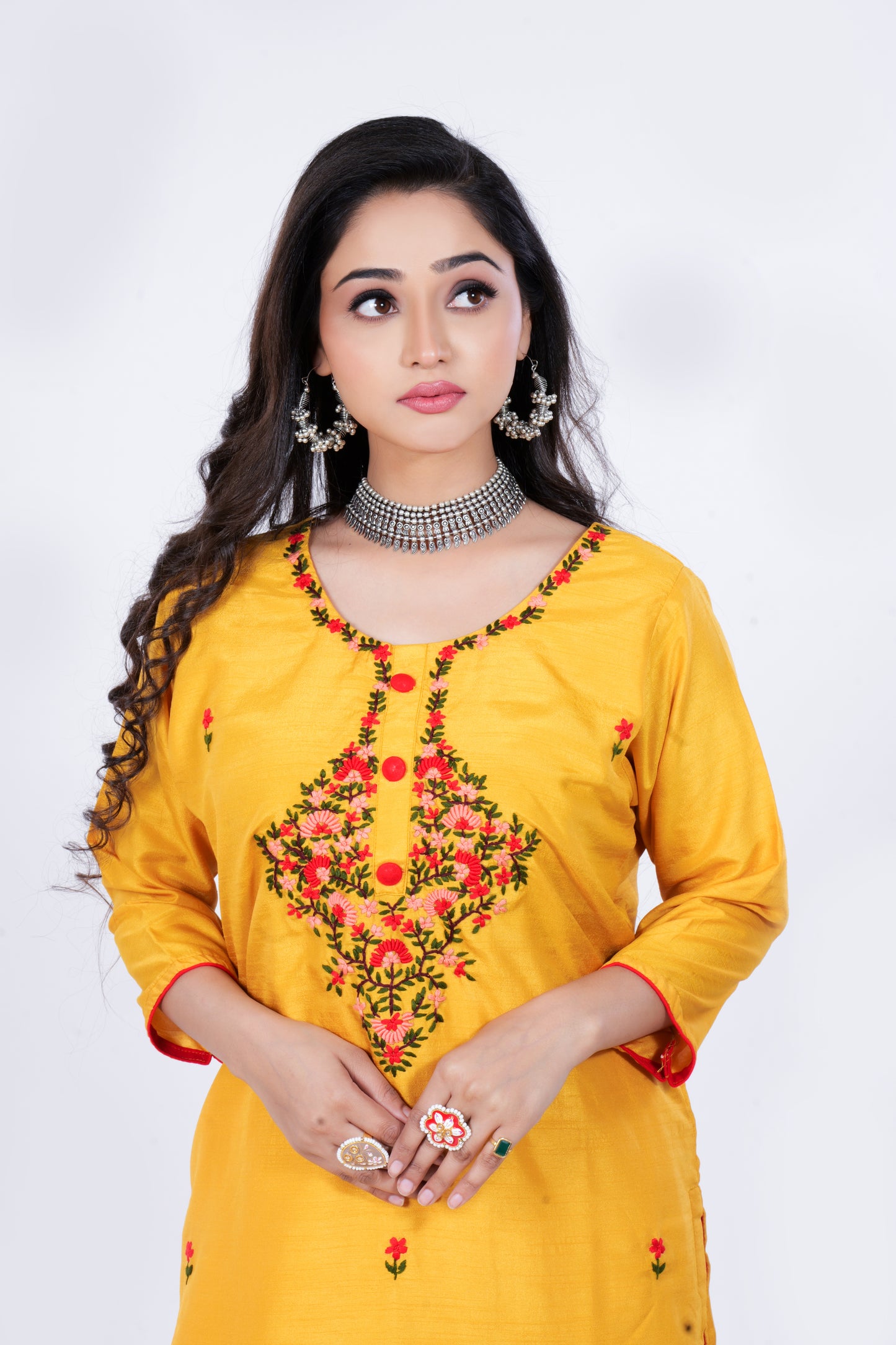 Straight Kurta is made from Soft Dola Silk and Hand Embroidery in Yellow